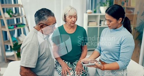 Image of Senior, physiotherapy and couple with doctor and tablet for a consultation and retirement healthcare. Rehabilitation, patient and woman speaking to a physiotherapist with tech for medical advice