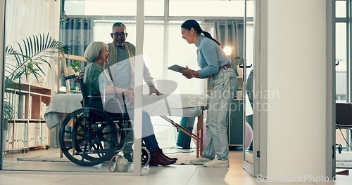 Image of Senior, physiotherapy and couple with doctor and tablet for a consultation and person with disability. Rehabilitation, patient and woman speaking to a physiotherapist with tech for medical advice