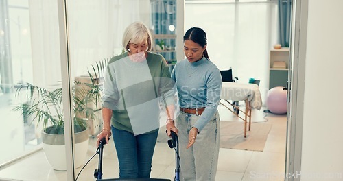 Image of Senior, physiotherapy and woman with doctor support and helping at a consultation for patient with a disability. Rehabilitation, clinic and person at hospital for physiotherapist and medical advice