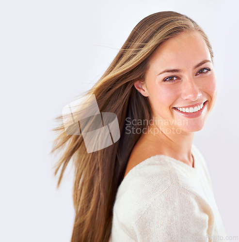Image of Portrait, woman and happy for hair care, treatment and growth isolated on gray background. Female person, smile and hairstyle in studio with hairdo for beauty, shampoo and hairdressing in Ukraine