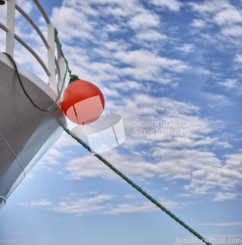 Image of Buoy, ship and travel with transportation and blue sky, nature and fresh air, vacation or journey on cruise with safety for sailing. Boat, yacht for sea voyage or adventure, luxury and life preserver
