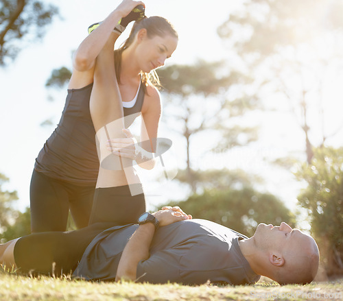 Image of Nature, stretching and man with personal trainer for help, workout coach and fitness for healthy body. Exercise, wellness and athlete with woman in muscle warm up for outdoor training in morning.