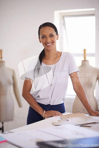Image of Fashion, woman and portrait of tailor with drawing on paper for planning in workshop with mannequin. Creative, designer or smile with sketch on table and happiness for unique style in boutique studio