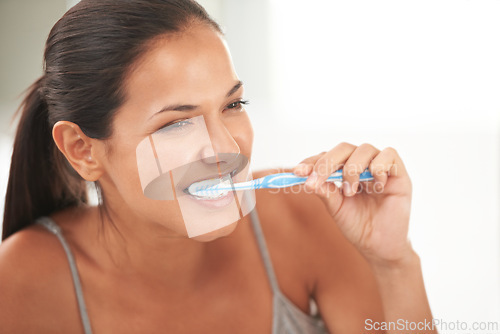 Image of Health, bathroom and woman with toothbrush for cleaning, oral hygiene and dental care in home. Toothpaste, healthcare and person brushing teeth for whitening, wellness and grooming for gum disease