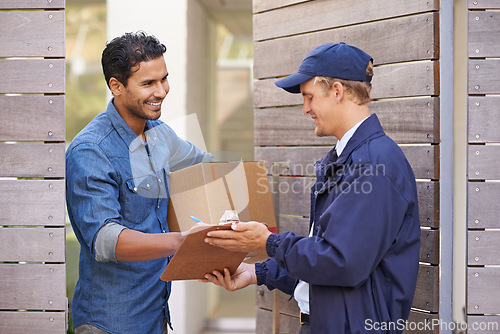 Image of Delivery, sign and man in home with courier for shipping, logistics and online shopping with box. Ecommerce, paperwork and customer with signature for package, parcel and cargo receipt for service