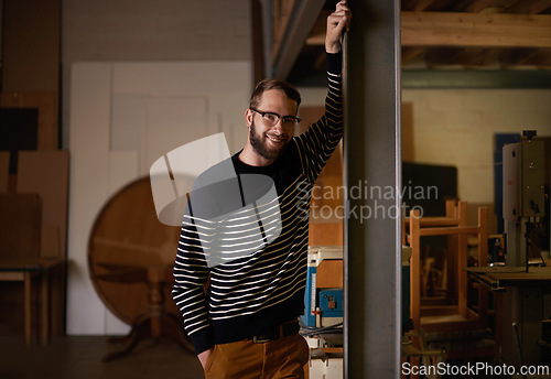 Image of Man, portrait and smile in home to relax, confident and pride for comfort or enjoyment in living room. Male person, glasses and happy with eyewear for wellness, satisfaction and weekend in apartment