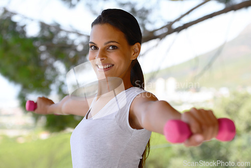 Image of Happy woman, portrait and weightlifting with barbells for workout, exercise or outdoor training at home. Female person lifting weight, small dumbbells or fitness for muscle gain, health and wellness