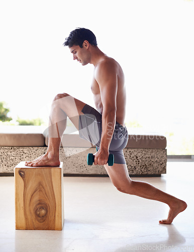 Image of Fitness, box and dumbbell with body of man in home for workout or strong physical activity. Exercise, shirtless and lunges with confident young person training at apartment for health or wellness