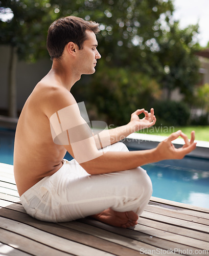 Image of Lotus hands, man and poolside meditation for peace, healing or mental health wellness. Sunshine, zen or male person on a deck with spiritual, balance or breathing, exercise and holistic stress relief