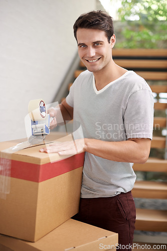 Image of Man, portrait and boxes in home for moving with investment in real estate, new house pr relax with happiness. Person, face or smile with tape on cardboard for storage, cargo or package for relocating