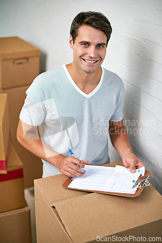 Image of Man, package and portrait with clipboard for moving, delivery and documents for logistics, smile and invoice. Person, cardboard and boxes with paperwork for service, signature and stock in new house