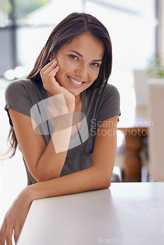 Image of Woman, portrait and smile in home for relax confidence on weekend in Mexico for vacation, peaceful or kitchen counter. Female person, face and resting getaway or carefree comfort, leisure or wellness