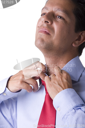 Image of adjusting the necktie