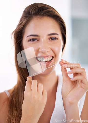 Image of Happy, dental and portrait of woman with floss for health, wellness and clean routine for hygiene. Oral care, smile and female person with dentistry tool for teeth or mouth treatment in bathroom.