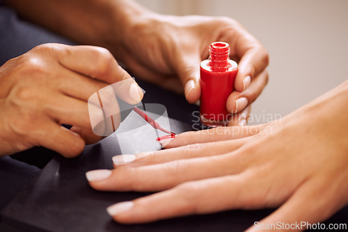 Image of Nail polish, manicure and hands of woman with red color for salon treatment, cosmetics and pamper. Luxury spa, beautician and person painting nails for grooming service, beauty aesthetic and wellness