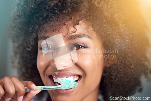 Image of Black woman, portrait and toothbrush for teeth cleaning in bathroom, dental health and self care closeup for fresh breathe. Orthodontics, oral hygiene and morning routine with toothpaste at home