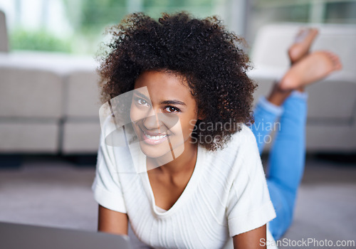 Image of Happy, computer and portrait of woman on floor working on freelance creative project in living room. Smile, technology and female designer typing on laptop for research on carpet in apartment.