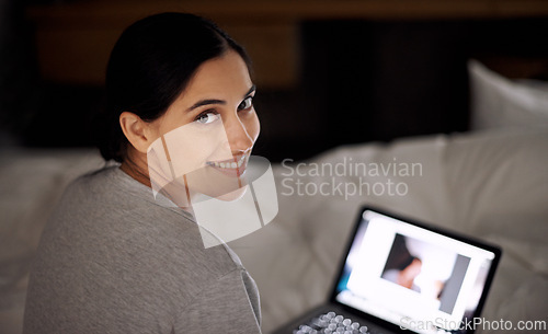 Image of Portrait, bedroom and woman with smile for laptop online for movies on site to download on app. Night, female person and girl watching videos with technology, connection and internet in home