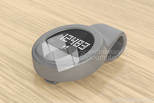 Image of Grey clip-on fitness tracker