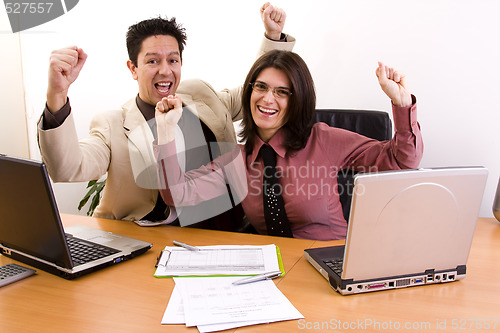 Image of confident and successful business team