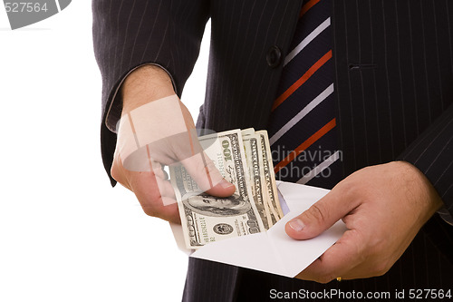 Image of businessman counting his money