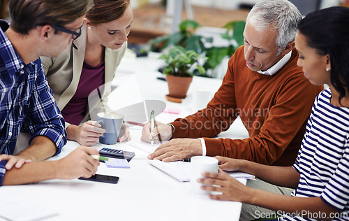 Image of Diverse group, coworker and writing with teamwork for strategy on planning, project and ideas as accountant in office. Leader, collaboration and notes with calculation for business and finance