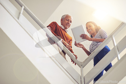 Image of Professional people, office and tablet at staircase for feedback, discussion or consulting with manager. Business employees, workplace and technology for planning, collaboration and support for idea