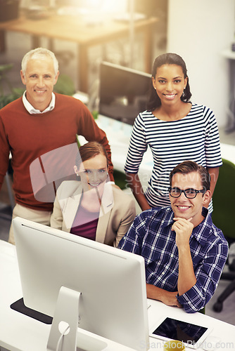 Image of Diverse group, coworker and smile with computer at office for teamwork, strategy and planning for work. From above, happy and satisfied with collaboration as group for project in startup business.