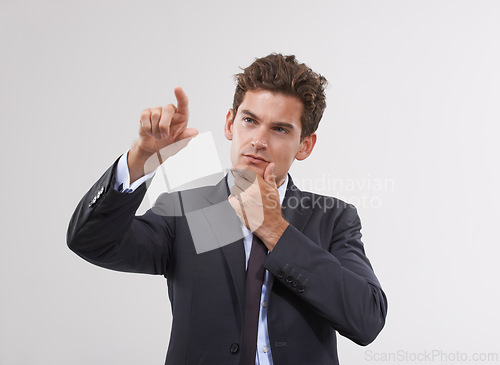 Image of Hand, thinking or businessman on touchscreen in studio on white background for metaverse access. Future, interface or software system login for finger pointing, doubt or air technology for networking