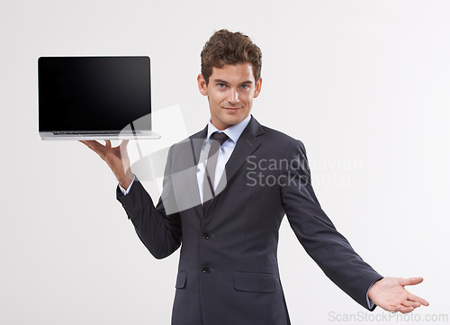 Image of Portrait, screen and man holding a laptop, presentation or connection on white studio background. Face, employee or model with tech, internet or computer with email, showing and digital app with info