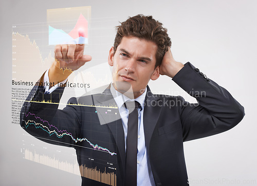Image of Businessman, thinking and trading with marketing hologram for digital profit or cost on a gray studio background. Man, trader or financial broker in wonder on virtual dashboard for company finance
