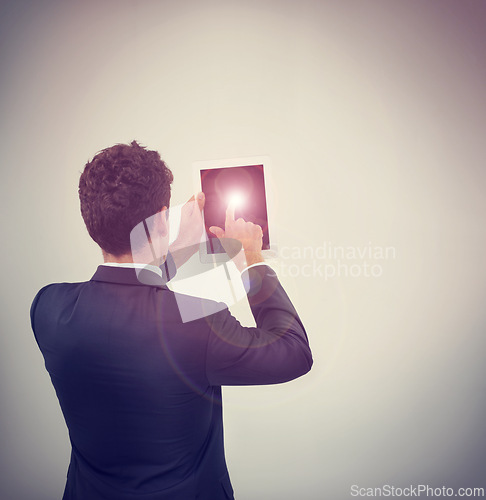 Image of Businessman, tablet and touch with mockup space for interaction, UI or UX on a studio background. Rear view of man or employee on technology for digital innovation, connectivity or communication