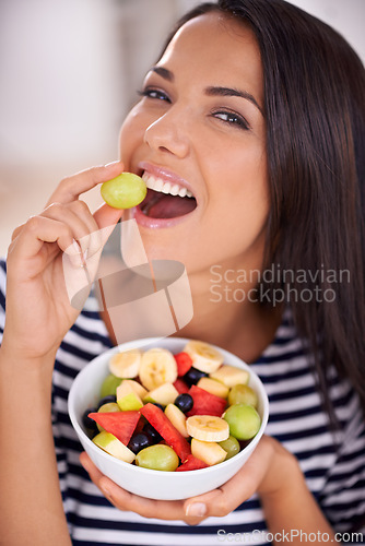 Image of Portrait, woman and fruit bowl for eating, natural nutrition and healthy organic food. Happy, female person with snack with vitamins for skin and wellness, balance diet and salad with vegan choice