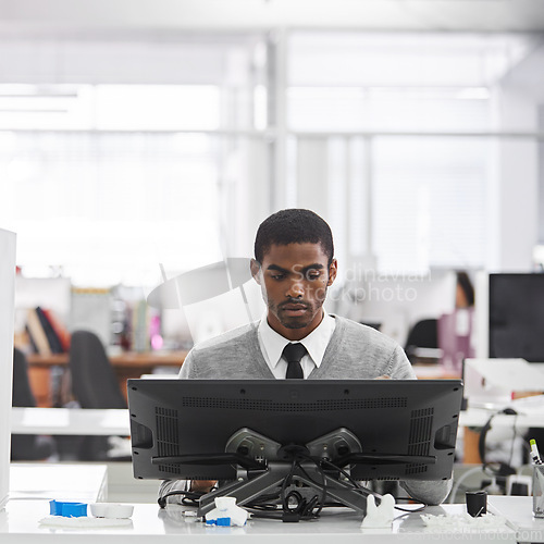 Image of Black man, technology and worker with computer at workplace, office and professional at desk for creative career. African male person, graphic designer or illustrator working on designs on 3D printer