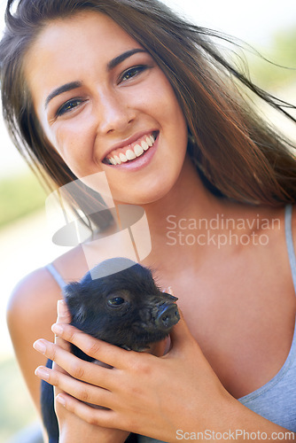 Image of Portrait, woman and pig for volunteer, charity organization and rescue center. Welfare, smile and face of female person with piglet for foster care, adoption and animal sanctuary for nonprofit or ngo