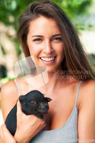 Image of Portrait, outdoor and woman with a piglet, smile and sunshine with weekend break and bonding together. Face, person and girl with animal and pet with summer and cheerful with fun, joy and happiness