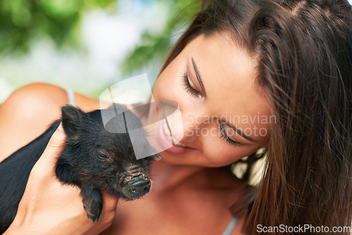 Image of Woman, pig and happiness for volunteer, charity organization and rescue center. Welfare, smile and female person with piglet for foster care, adoption and animal sanctuary for nonprofit or ngo