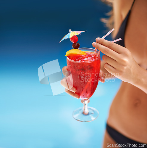 Image of Cocktail, hand and woman in swimwear on vacation, weekend break and summer party in Fort Lauderdale. Person, glass and alcoholic drink in bikini for relax, peace and rest outdoor at holiday resort