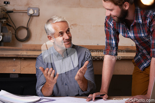 Image of Architects, teamwork and men with blueprint in office for building, construction or repairs. Engineering, design and industrial apprentice plan and working on industry project with mentor in workshop