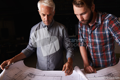 Image of Engineering, collaboration and men with architecture blueprint in office for building, construction or repairs. Team, design and industrial apprentice plan and working on industry project with mentor