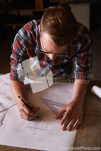 Image of Man, architect sketch blueprint and construction for engineering, renovation project and drawing tools. Floor plan, design and property development with architecture top view and creative in workshop