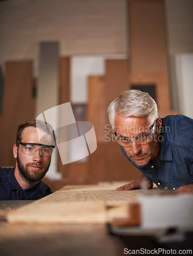 Image of Workshop, wood and father with son, teamwork and construction with property development and cooperation. Family, parent and collaboration with maintenance and planning with solution, tools and gear