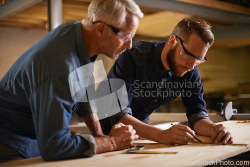 Image of Family, father and son in a workshop, architect and woods with drawing or safety glasses with protection. Parent, men or teamwork with construction or building with planning for project or renovation