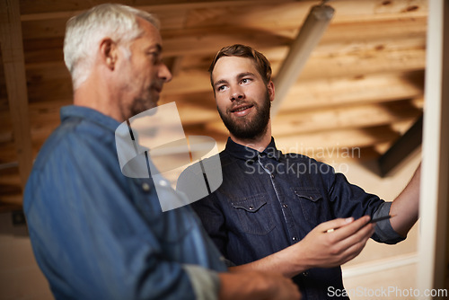 Image of Planning, teamwork and architects by board in workshop for industrial carpentry project. Brainstorming, engineering and male industry apprentice working on ideas with mentor in office on site.