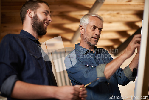 Image of Planning, brainstorming and architects by board in workshop for industrial carpentry project. Discussion, engineering and male industry apprentice working on ideas with mentor in office on site.