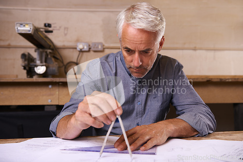 Image of Mature man, compass and architect drawing blueprint, construction and civil engineering with stationery. Drawing tools, equipment and closeup of hands with floor plan for property or renovation job