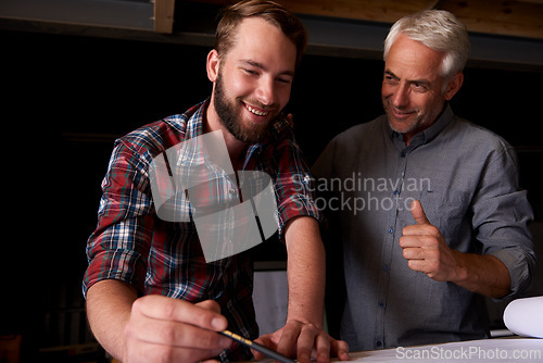 Image of Architect, team and happy men with blueprint, thumbs up or planning construction with father teaching son. Engineer, smile and like hand gesture of senior mentor with apprentice drawing in workshop