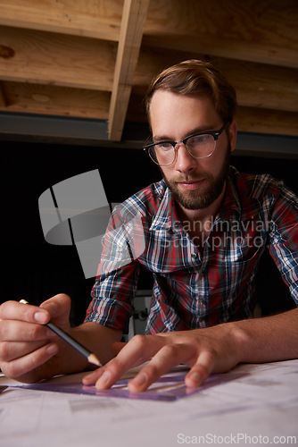 Image of Man, pencil and architect drawing floor plan, construction and civil engineering with stationery in workshop. Design tools, paperwork and closeup of blueprint for property development or renovation