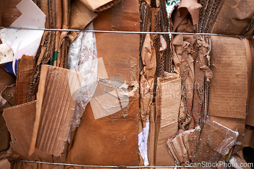 Image of Recycle, cardboard or box of trash in outdoor for waste management, junk yard garbage or rubbish. Community. background, organised closeup of dirty material with dump collection, litter or scrap pile