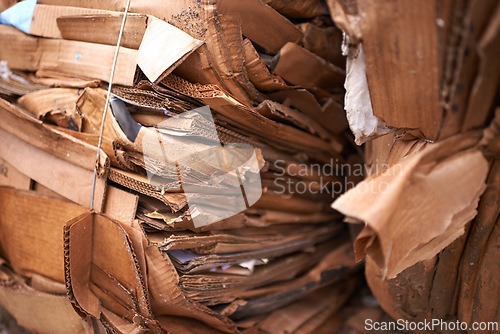Image of Recycle, cardboard or box of garbage in outdoor for waste management, junk yard trash or rubbish. Community, background, organised closeup of junk material with dump collection, litter or scrap pile